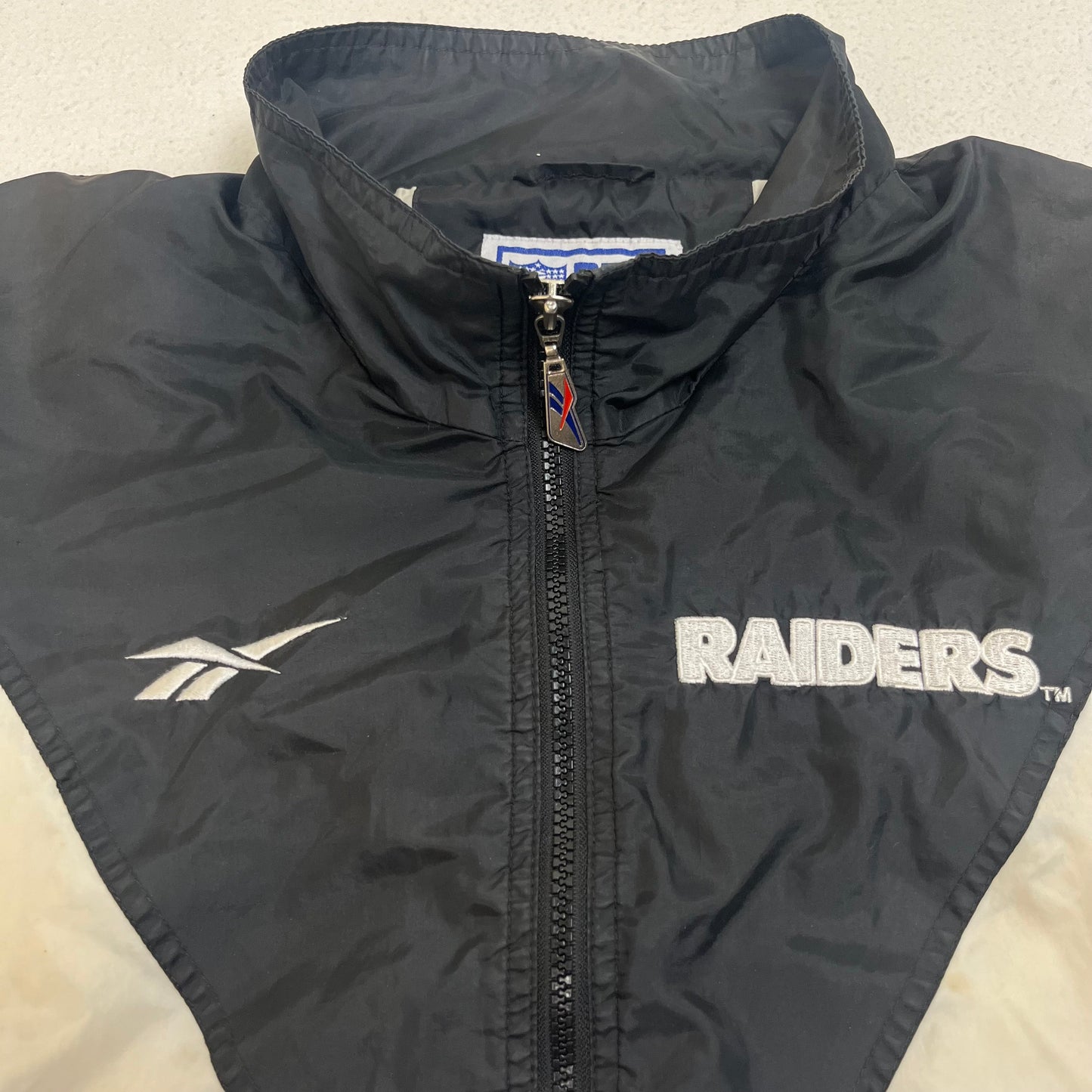 Vintage Reebok Raiders NFL Jacket